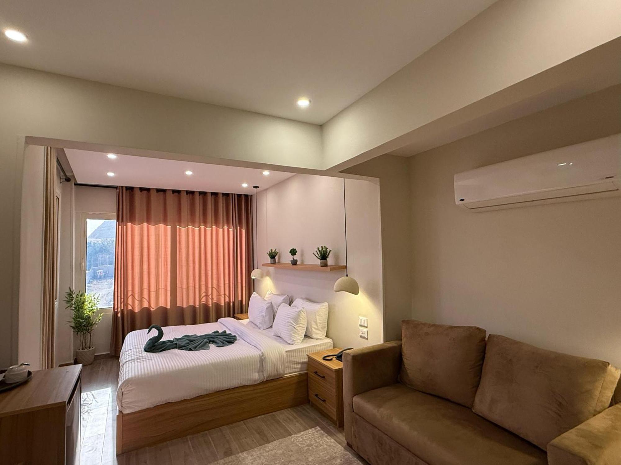 The Gate Hotel Front Pyramids & Sphinx View Kafrat al Jabal Exterior photo